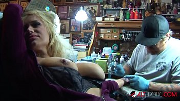 Shyla Stylez Gets Tattooed While Playing With Her Tits